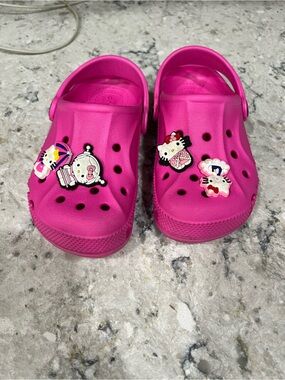 CROCS Kids Hot Pink Clog Sandals with Character Charms